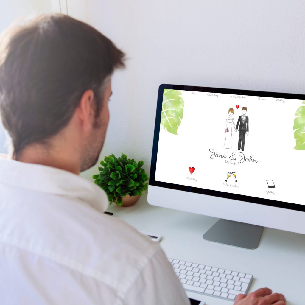 Man browsing wedding website on computer